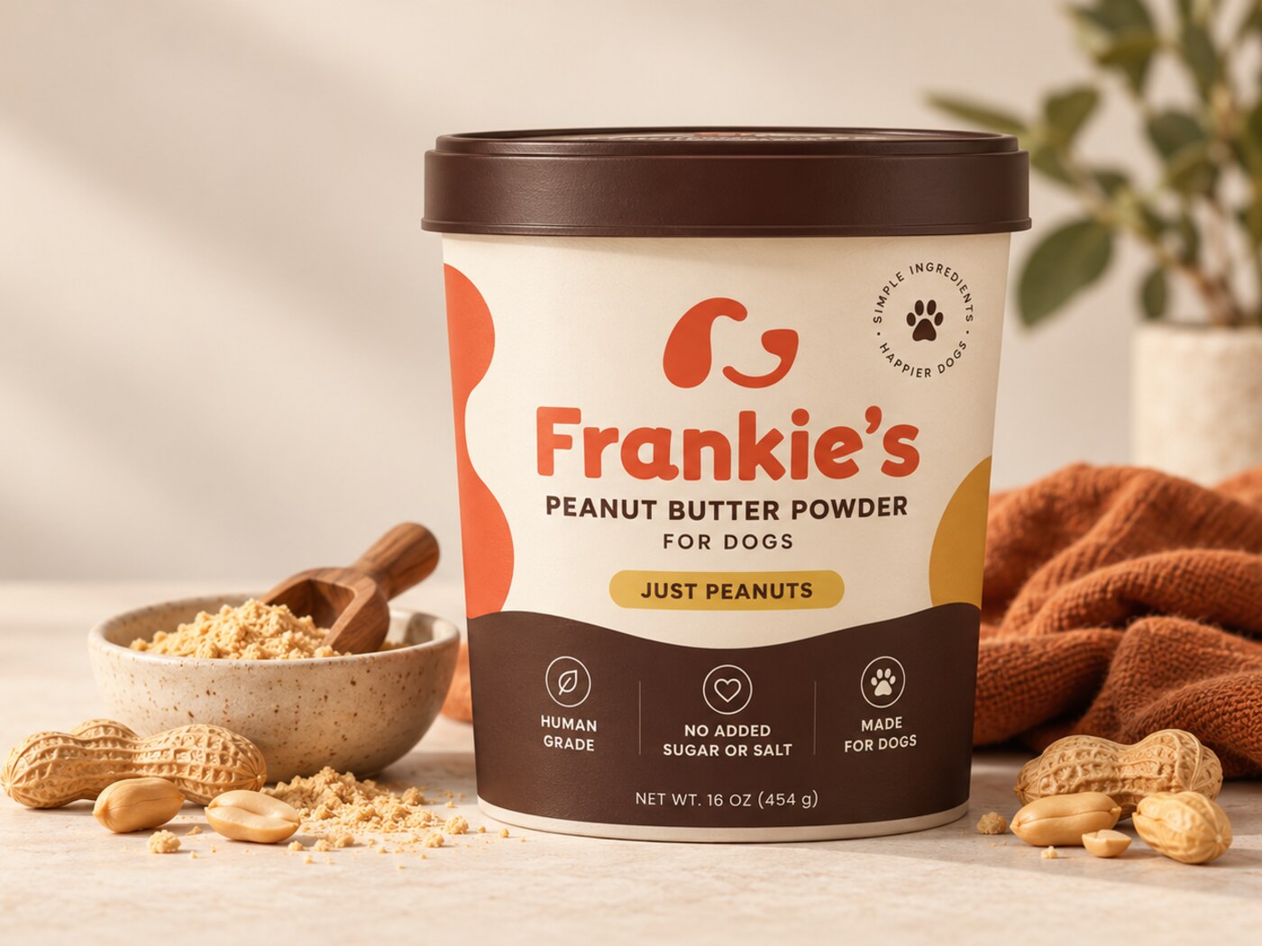 A tub of Frankie's Peanut Butter Powder for Dogs